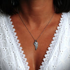 Pandantiv Aripă de înger din argint 925 – talisman realizat manual pentru protecție și speranță, bijuterie sculpturală în stil boho și rustic | Art Diva