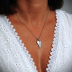 Pandantiv Aripă de înger din argint 925 – talisman realizat manual pentru protecție și speranță, bijuterie sculpturală în stil boho și rustic | Art Diva