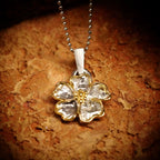 Pandantiv „Floare de cireș” din argint 925 cu accente aurii – talisman pentru primăvară și nou început, bijuterie sculpturală handmade în stil boho și rustic | Art Diva