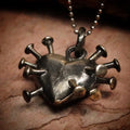 Pandantiv Inimă cu cuie din argint 925 oxidat – simbol al durerii și forței, bijuterie sculpturală handmade, Art Diva