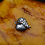 Pandantiv „Inima îngerului” din argint 925 oxidat – simbol al iubirii și protecției, bijuterie sculpturală în stil boho și rustic | Art Diva