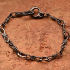 Brățară „Nodul iubirii” din argint 925 – talisman pentru legătura a două suflete, bijuterie sculpturală oxidată în stil boho-rustic | Art Diva