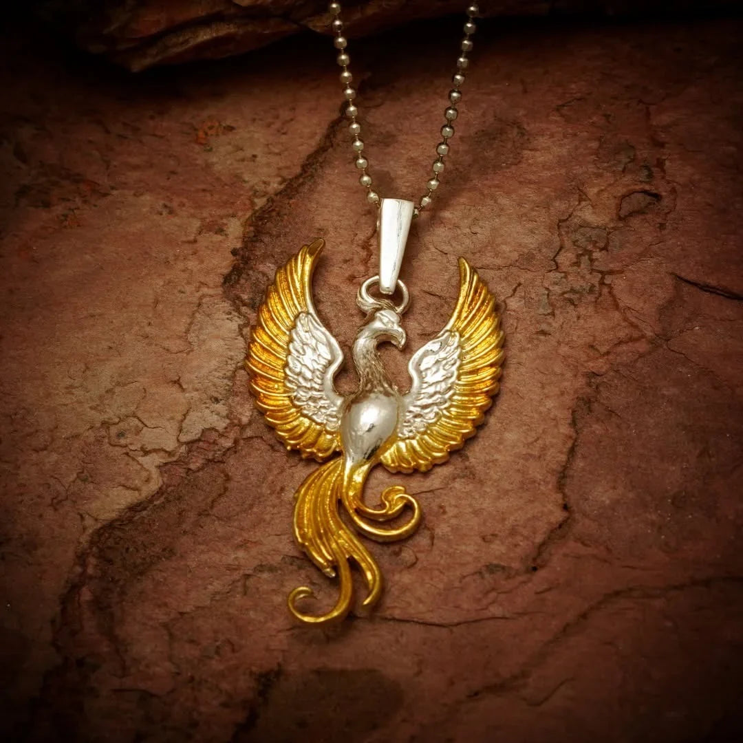 Pandantiv Phoenix din argint 925 cu accente aurii – talisman handmade pentru renaștere și forță, Art Diva