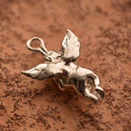 Pandantiv „Iubirea Îngerului” din argint 925 – talisman handmade pentru protecție și tandrețe, bijuterie sculpturală în stil boho și rustic | Art Diva